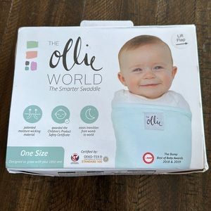 NIB- Ollie Swaddle One Size Color: Sky Blue